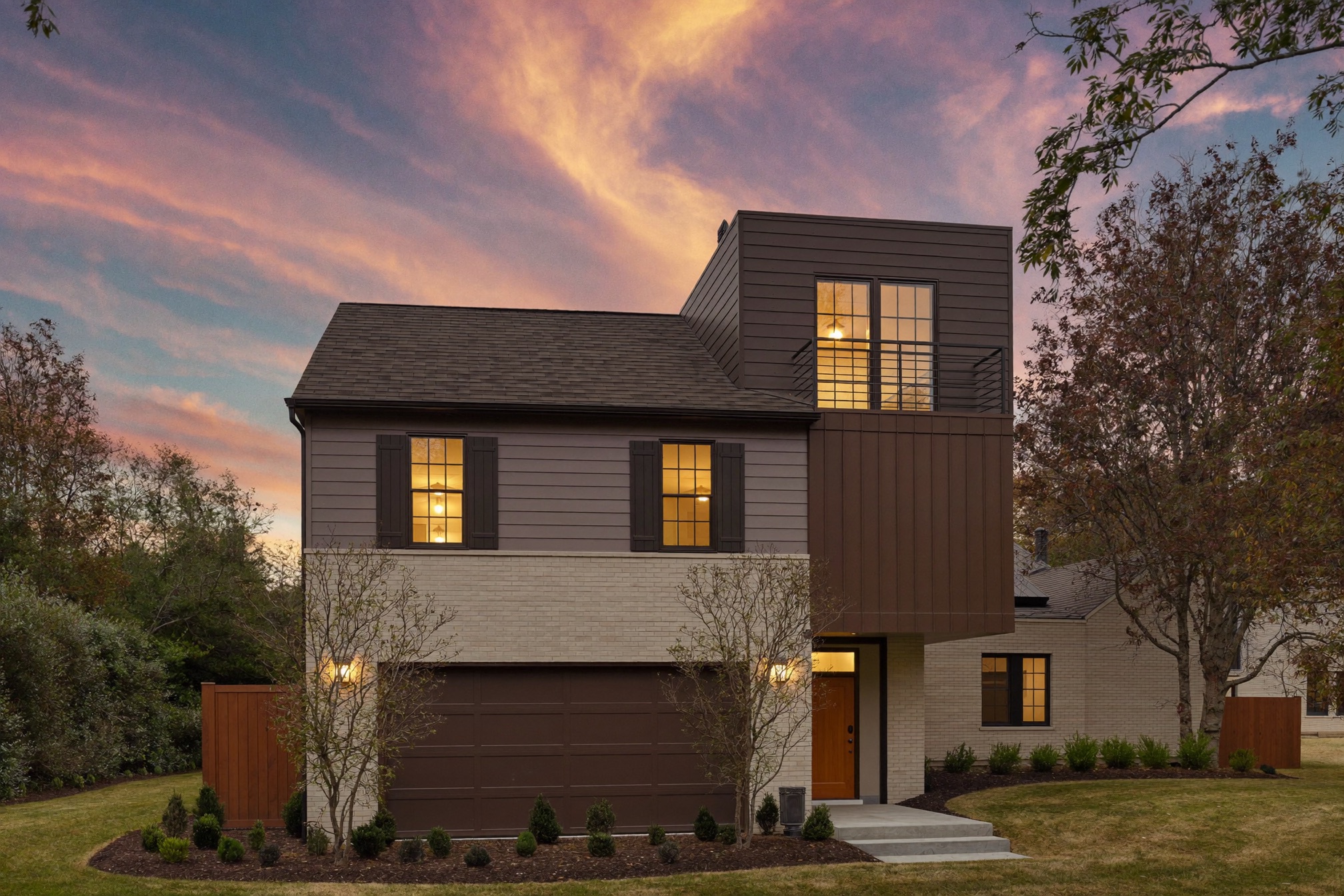 Edina two-story home with a new second-story addition at dusk